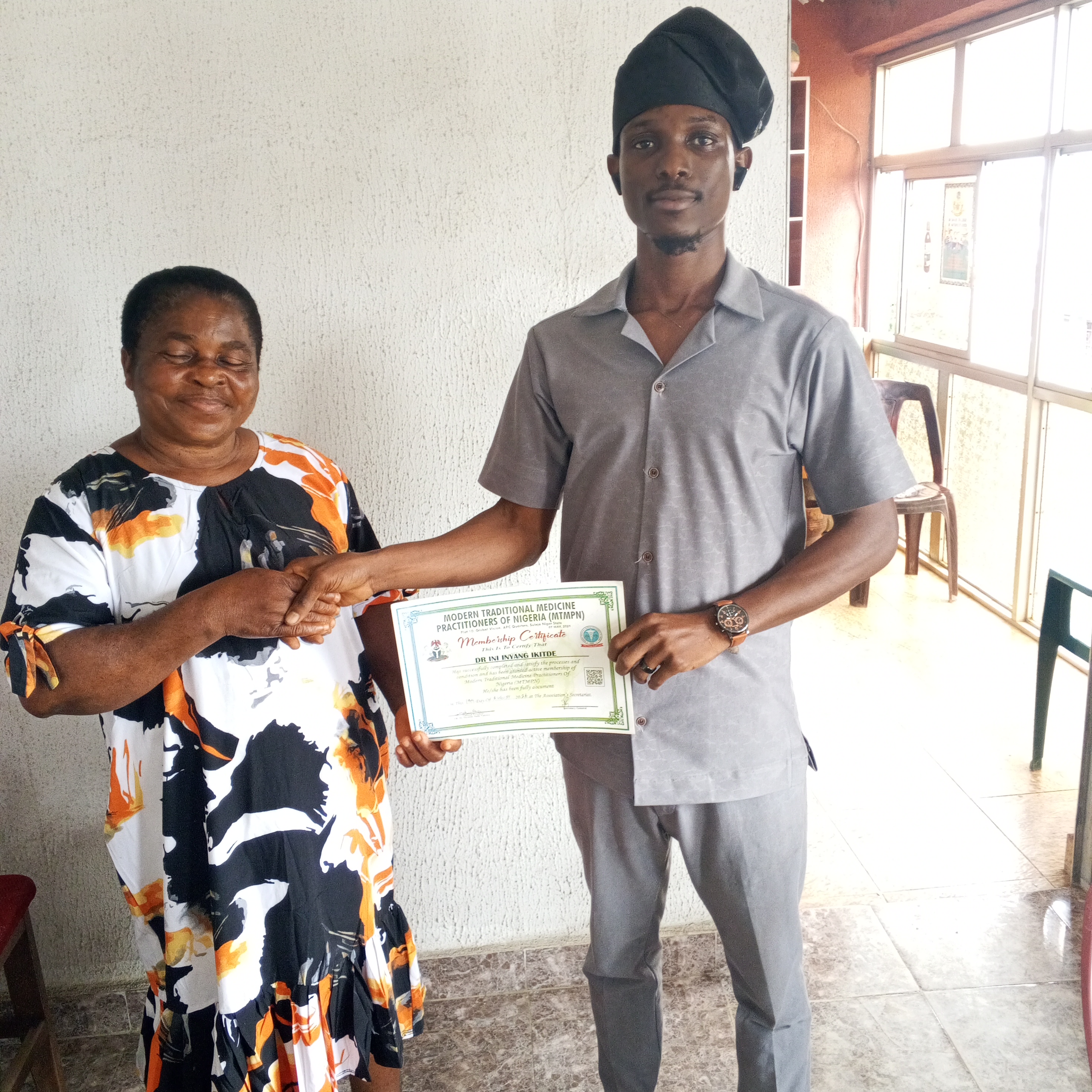 Student receiving certification from DDCNS