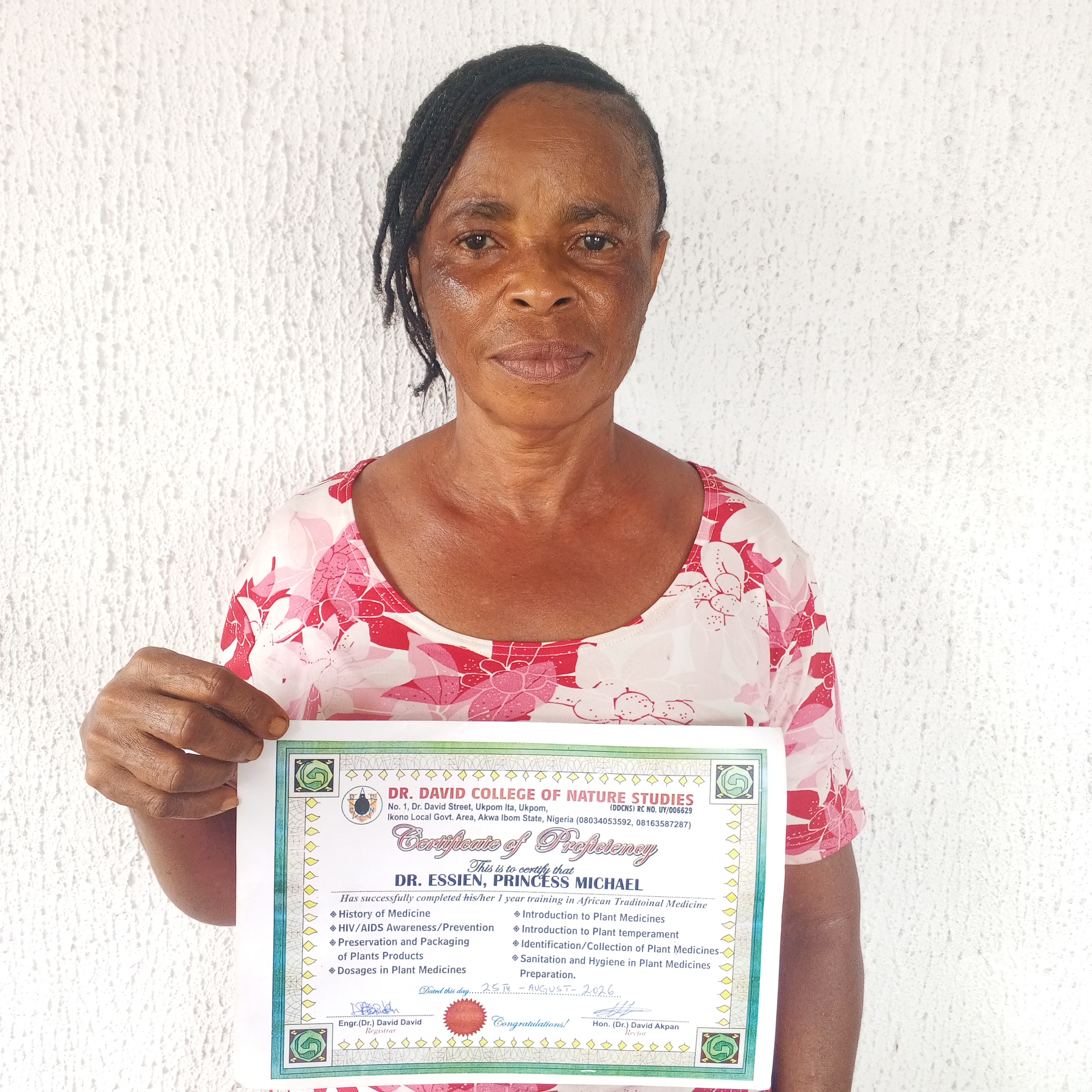 Student receiving certification from DDCNS
